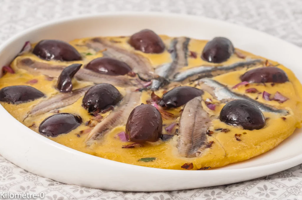 Socca aux oignons rouges, olives et anchois - Étape 7