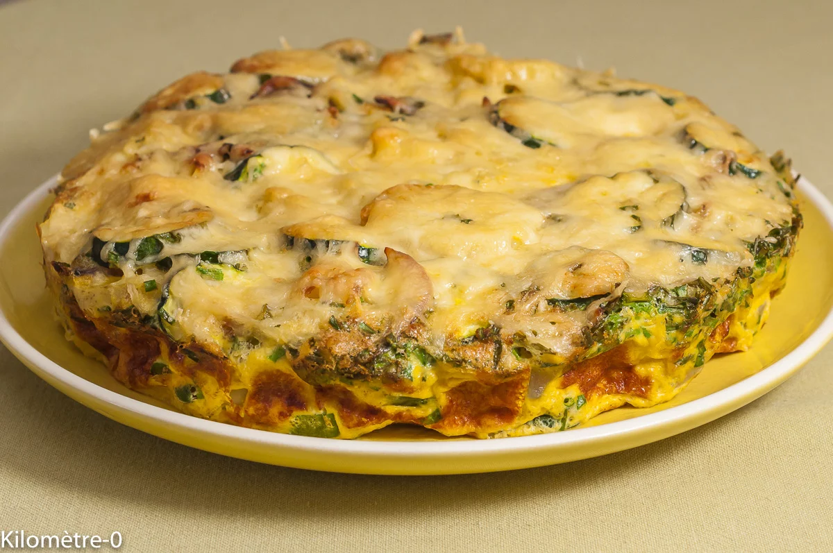 Photo de recette de frittata, tortilla, pommes de terre nouvelles, patates,pomme de terrre, courgettes, emmental, Kilomètre-0, blog de cuisine réalisée à partir de produits de saison et issus de circuits courts