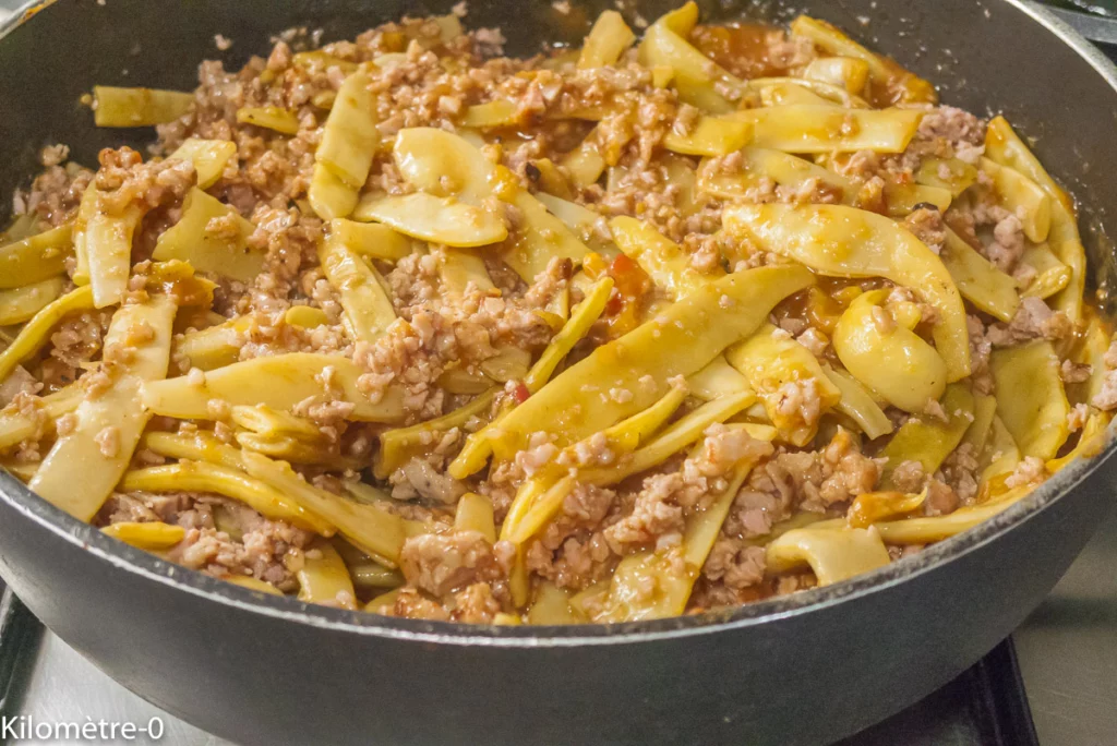 Poêlée de haricots plats aux tomates et à la chair à saucisses - Étape 7