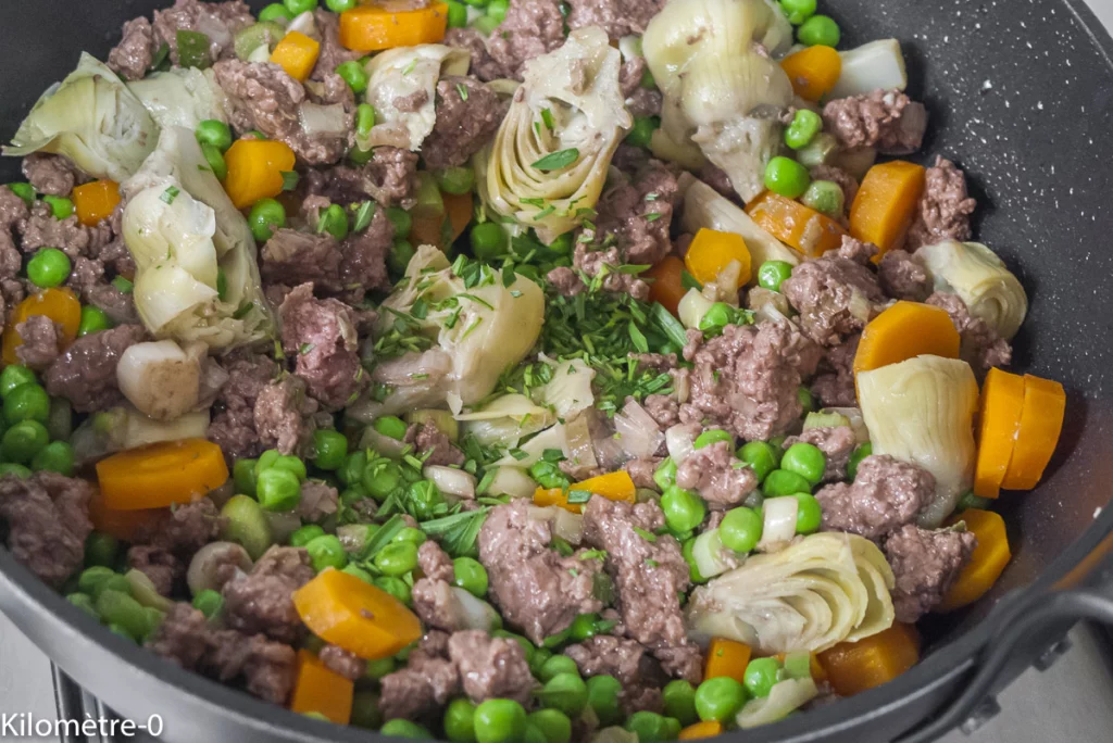 Poêlée de steak haché aux petits pois, carottes et artichauts - Étape 7