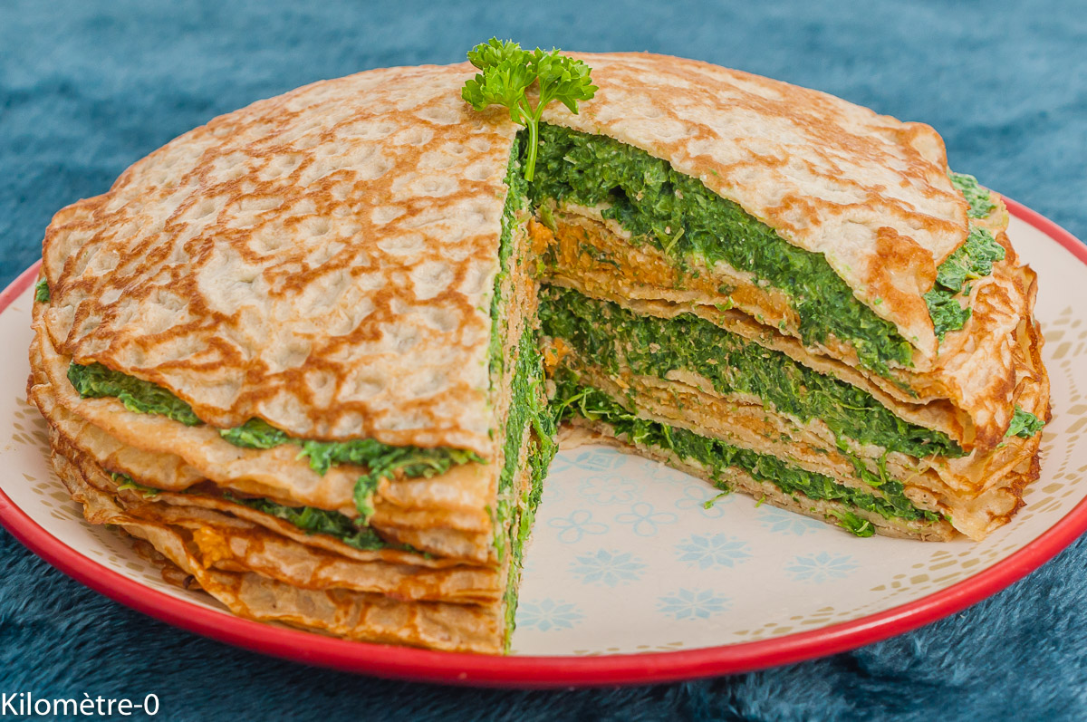 Photo de recette de gâteau de crêpes, crêpes salées, crêpes, végétarien, complète, énergétique, protéines, épinards , crème de pois chiches, pois chiche, facile, bio, ricotta, Kilomètre-0, blog de cuisine réalisée à partir de produits de saison et issus de circuits courts