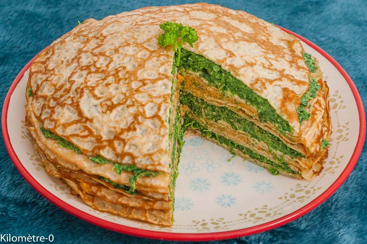 Photo de recette de gâteau de crêpes, crêpes salées, crêpes, végétarien, complète, énergétique, protéines, épinards , crème de pois chiches, pois chiche, facile, bio, ricotta, Kilomètre-0, blog de cuisine réalisée à partir de produits de saison et issus de circuits courts
